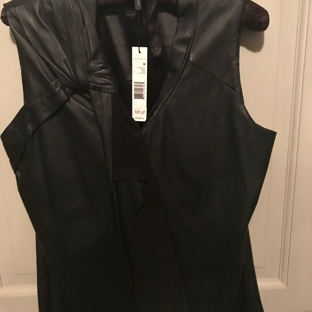 Ellie Tahari  black leather sleeveless top w/ side zipper v-neck.